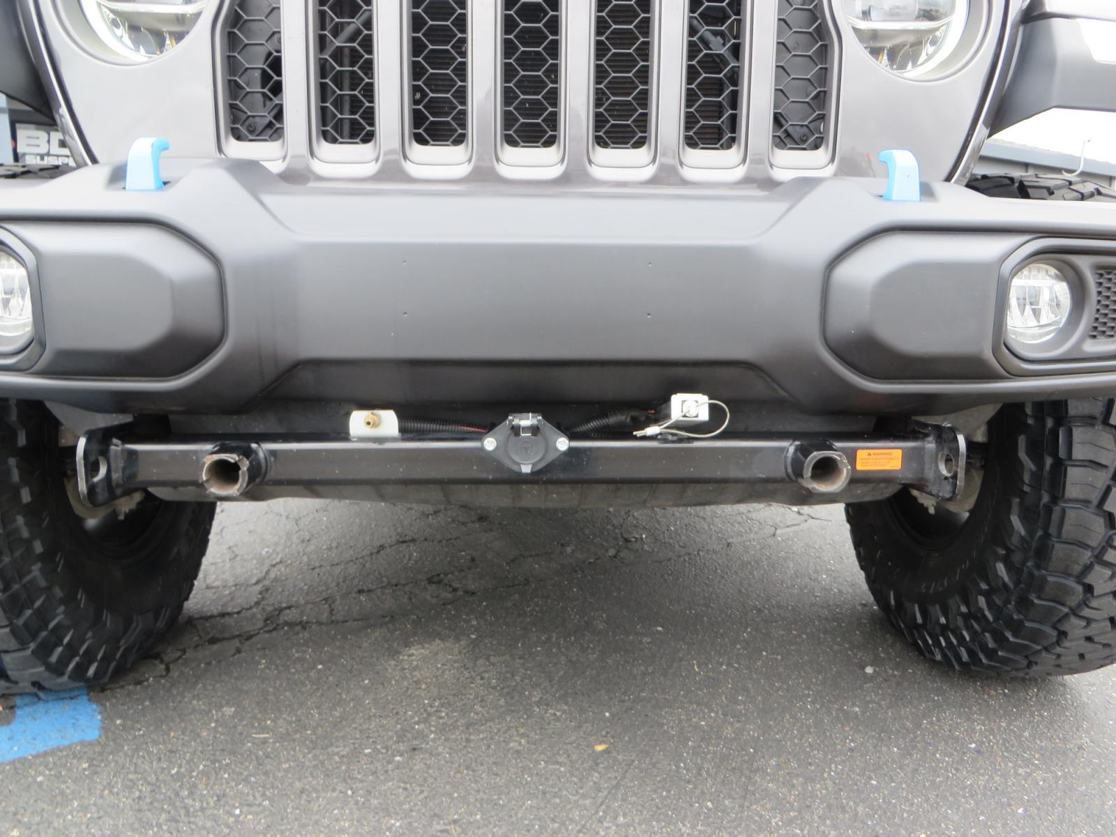 2021 CHARCOAL /BLACK Jeep Wrangler Unlimited Rubicon 4XE 4d SUV 4wd (1C4JJXR60MW) with an 2.0L L4 DOHC 16V TURBO engine, automatic transmission, located at 2630 Grass Valley Highway, Auburn, CA, 95603, (530) 508-5100, 38.937893, -121.095482 - 4XE Rubicon sitting on a Zone offroad suspension system, Fox shocks, 37" Toyo RT trail tires, 17" Method Race wheels, Teraflex Hd tire carrier, and Flat tow ready. - Photo #11